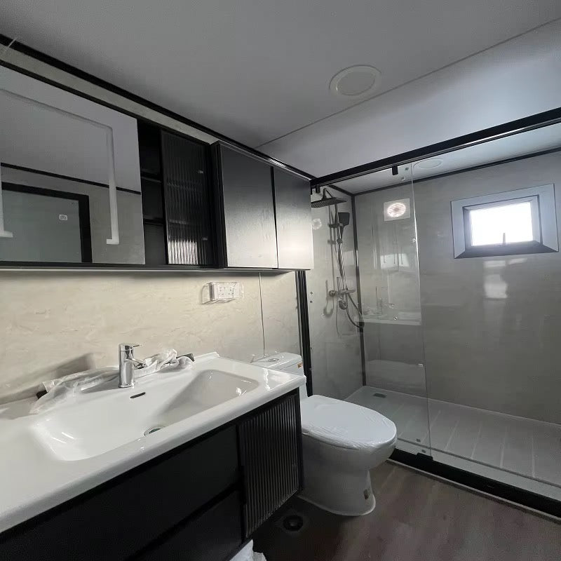 57 m² modulinis namelis su terasa ir lenktu stogu – pritaikytas žiemai