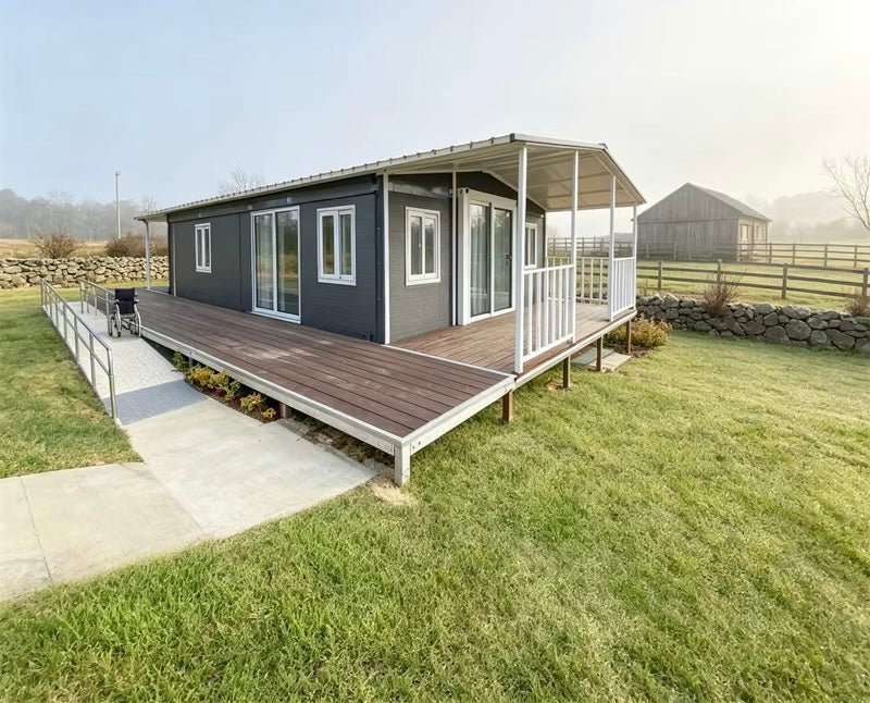 57 m² modulinis namelis su terasa ir lenktu stogu – pritaikytas žiemai