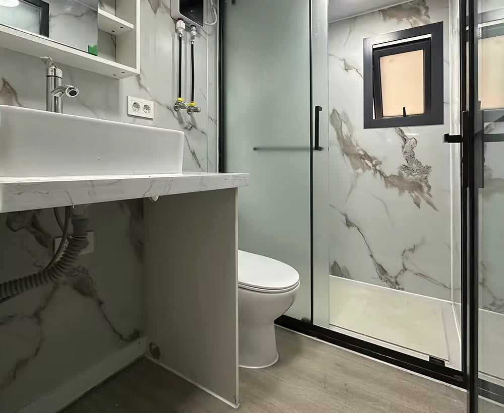 Modulinis namelis 57m² su terasa ir lenktu stogu